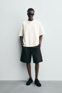 Alternative view of ÁO NỈ VẢI KỸ THUẬT DỆT INTERLOCK ĐÍNH NHÃN