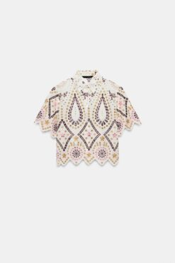 ÁO SƠ MI CỘC TAY THÊU HỌA TIẾT KIỂU THỦNG LỖ